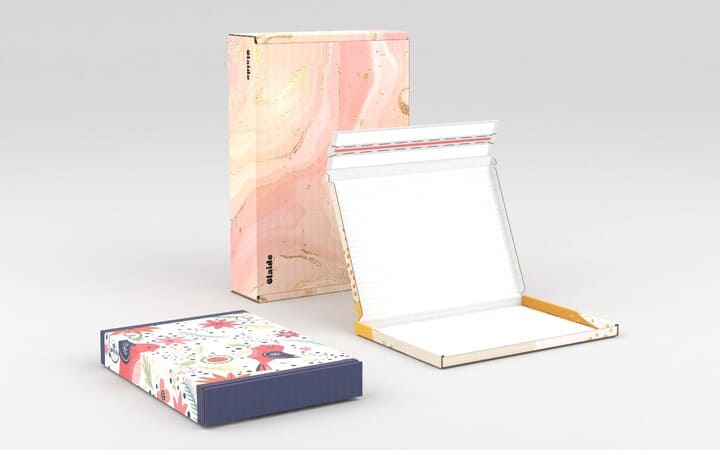 Foldable boxes with adhesive tape