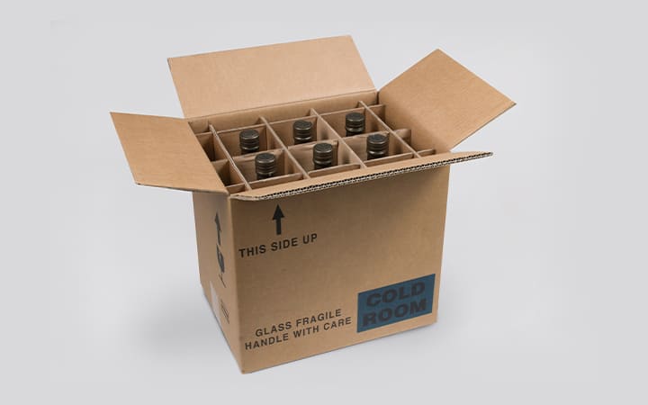 Versandkarton mit Inlay für Flaschen als Packhilfsmittel